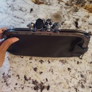 Black, four-finger ring, clutch purse